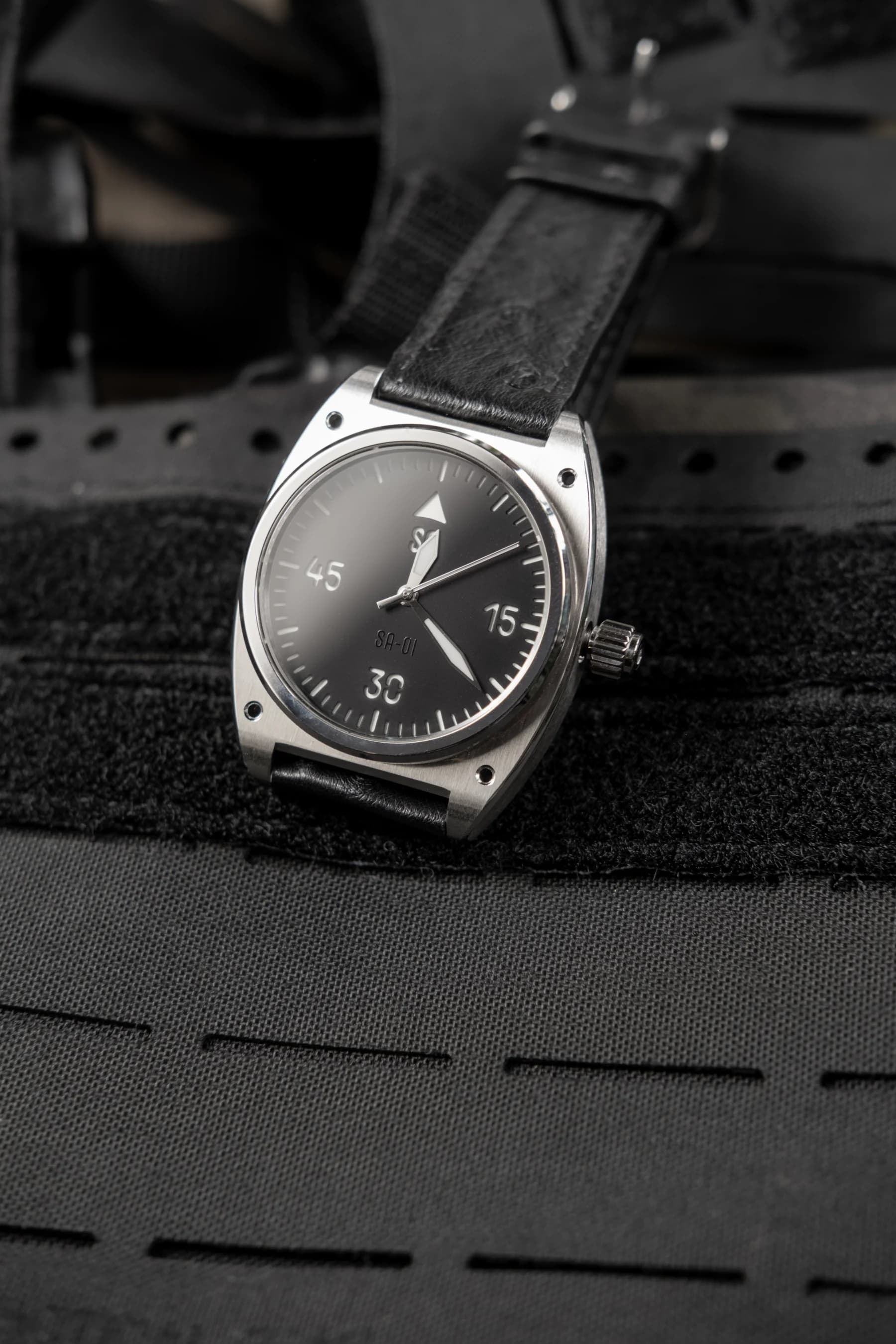 Specus SA-1 watch and dial prototypes arranged in a tray